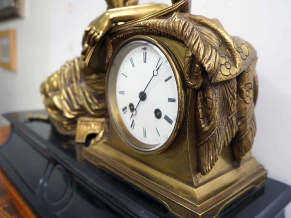 Bronze French style mental clock side view